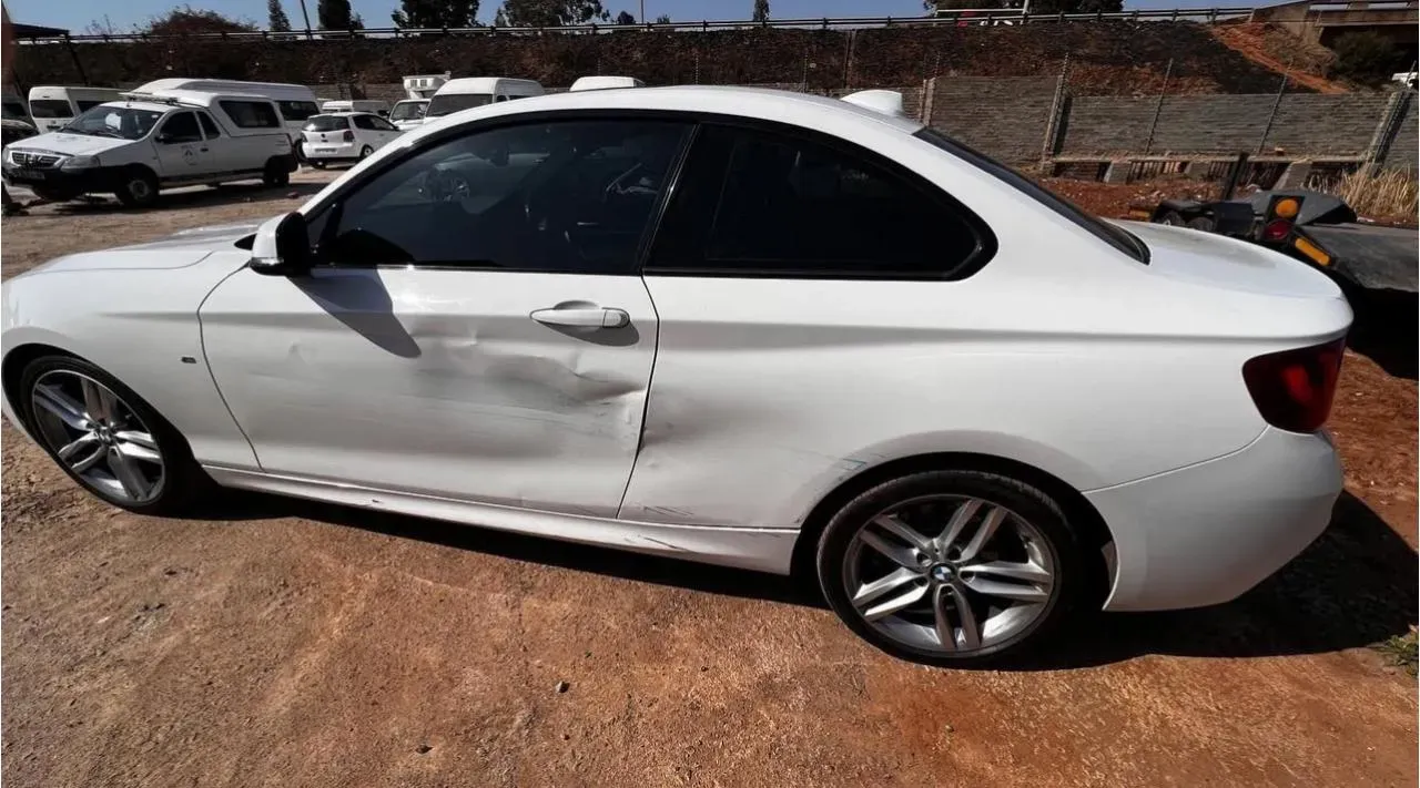 Before dent & scratches removal – vehicle door & panel with a visible dent and ding