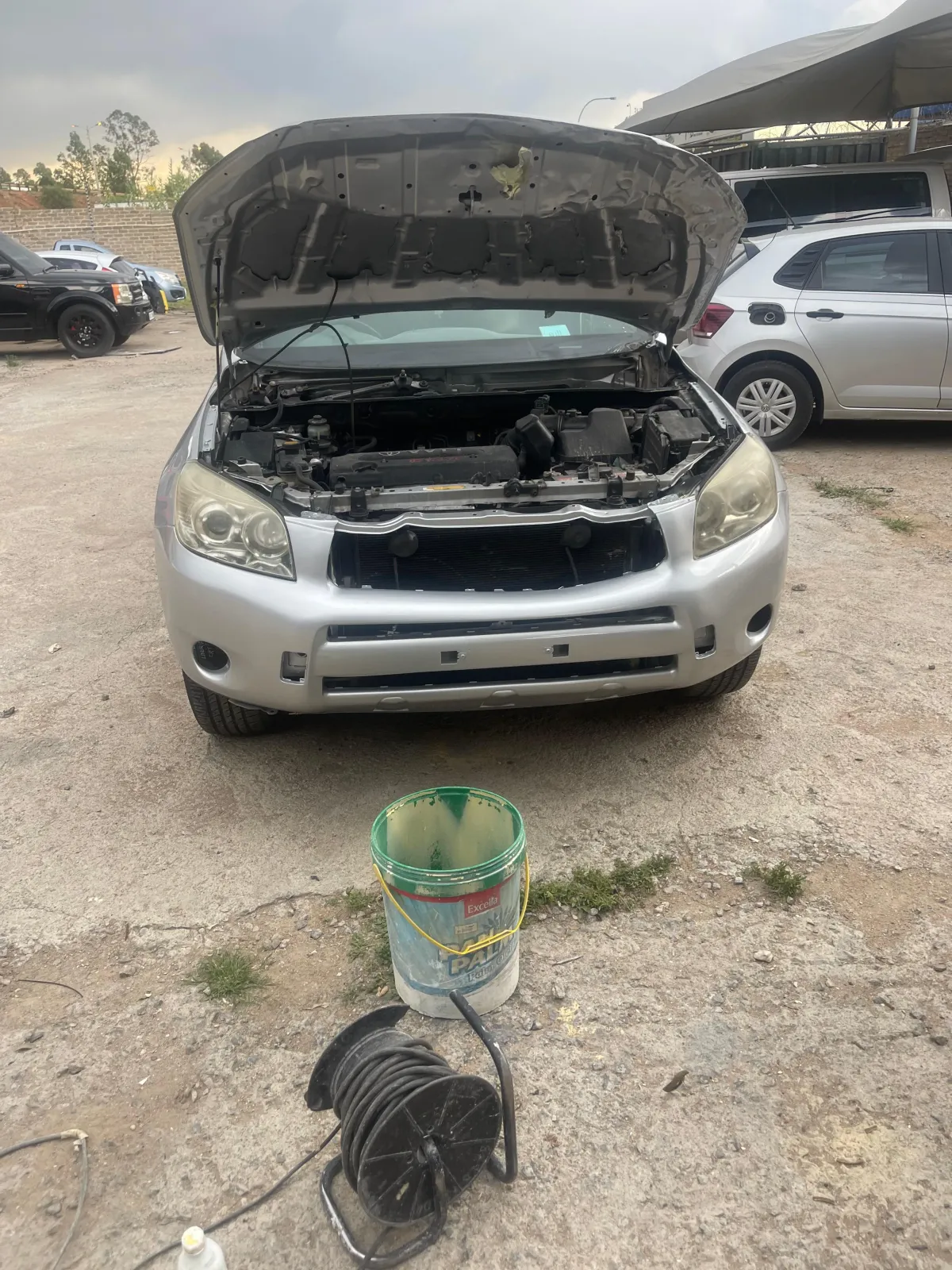 Before headlight restoration – cloudy, yellowed and hazy headlight lenses